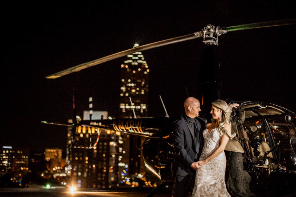 Helicopter Wedding Exit, Skyline Atlanta Wedding View, Couple Kissing on Rooftop | Ventanas – Atlanta, GA