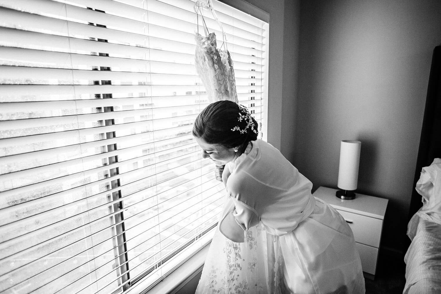 bride hugging her with dress