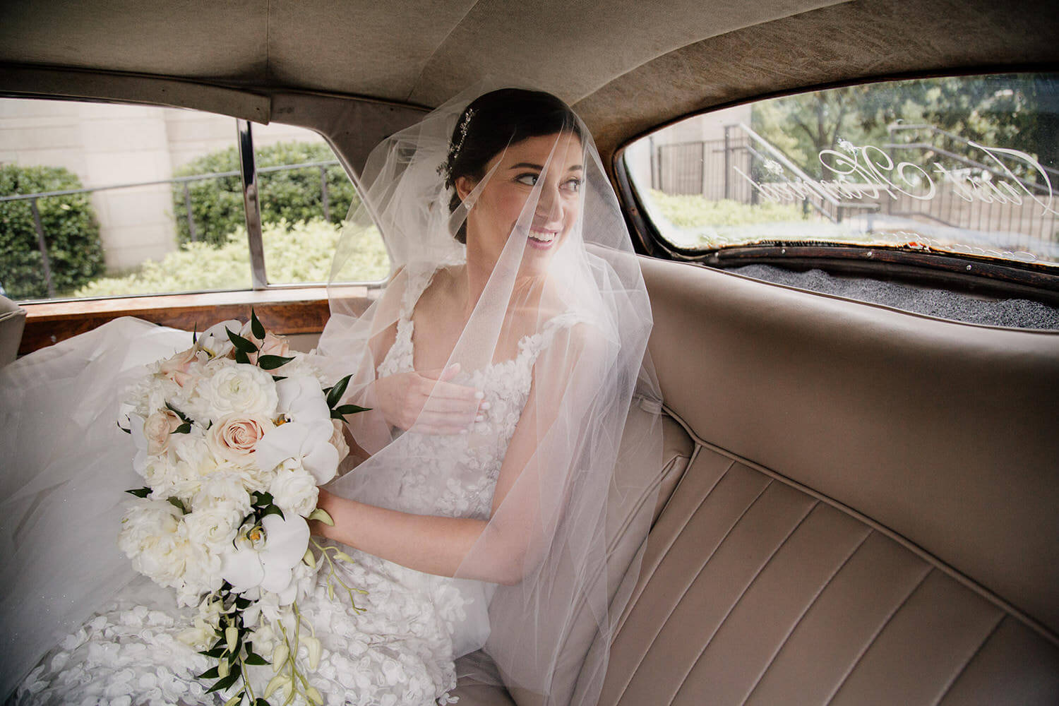 Bride waiting in the car