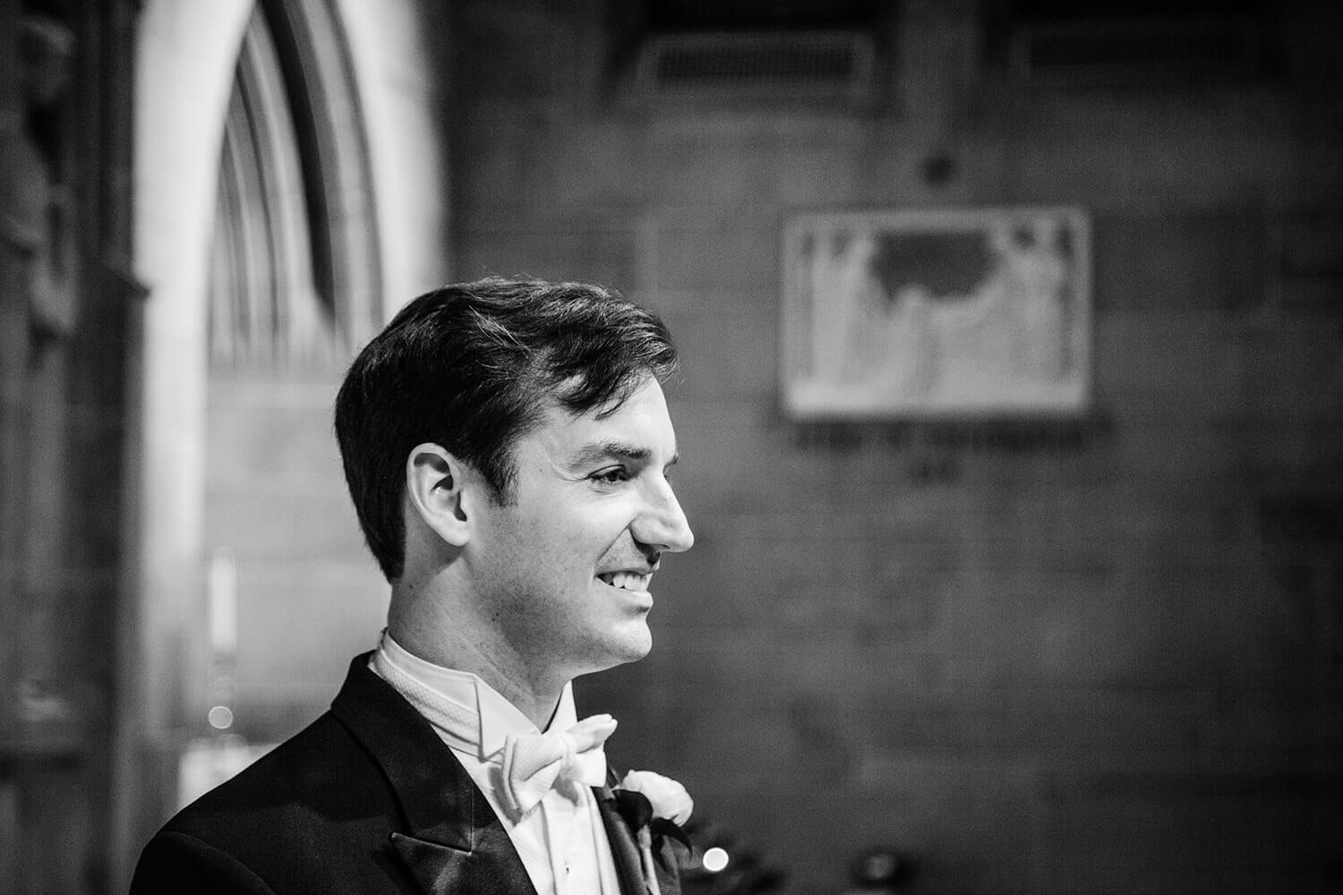 groom watching the bride entrance