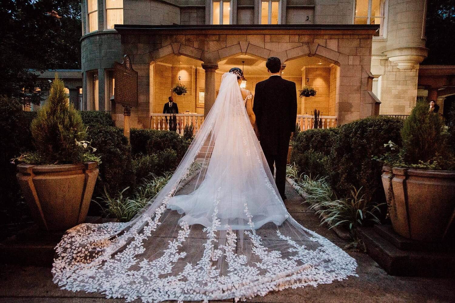 wedding couple infront at the the wimbish house