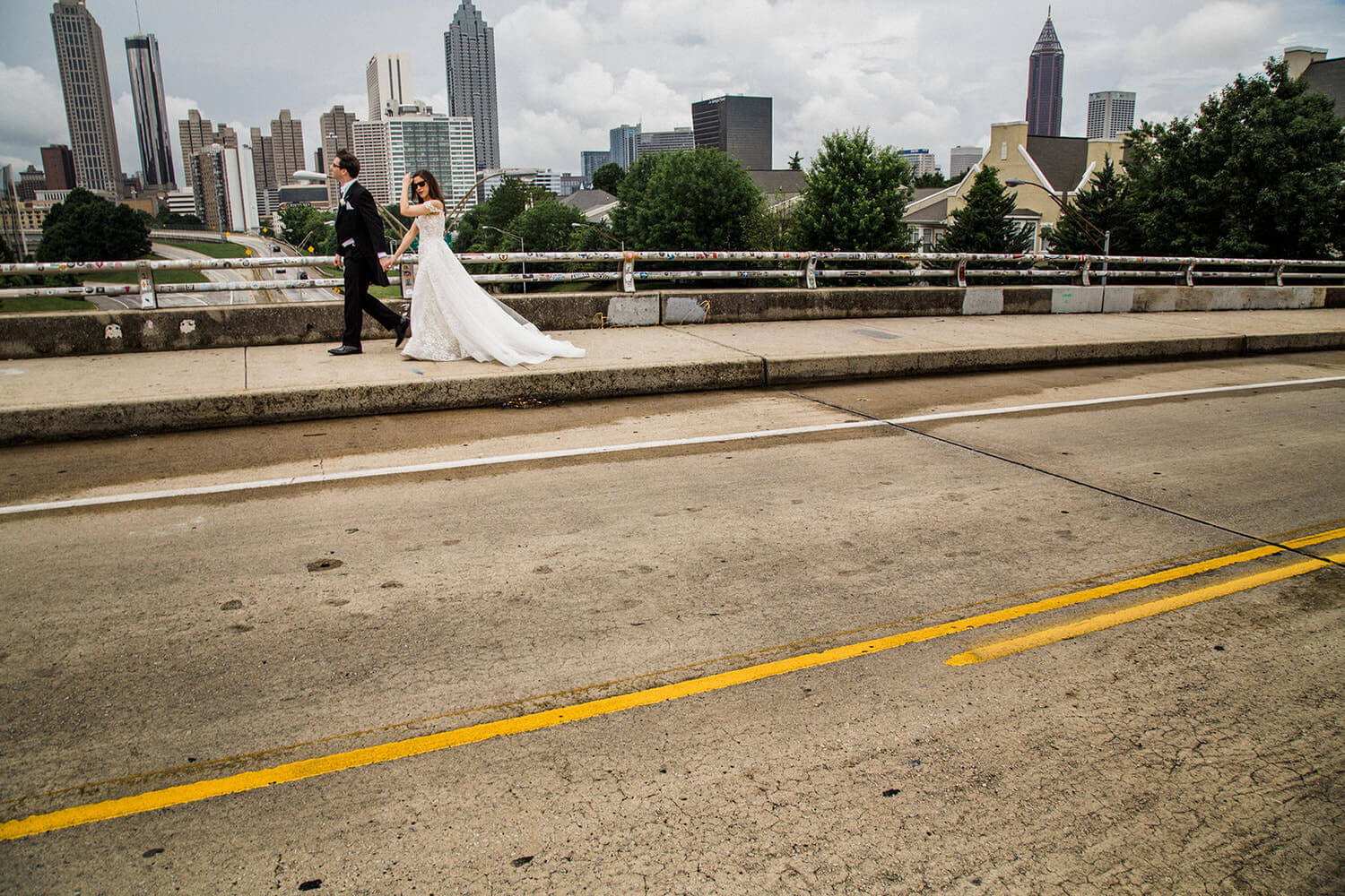 wedding couple at the Jackson Street Bridge