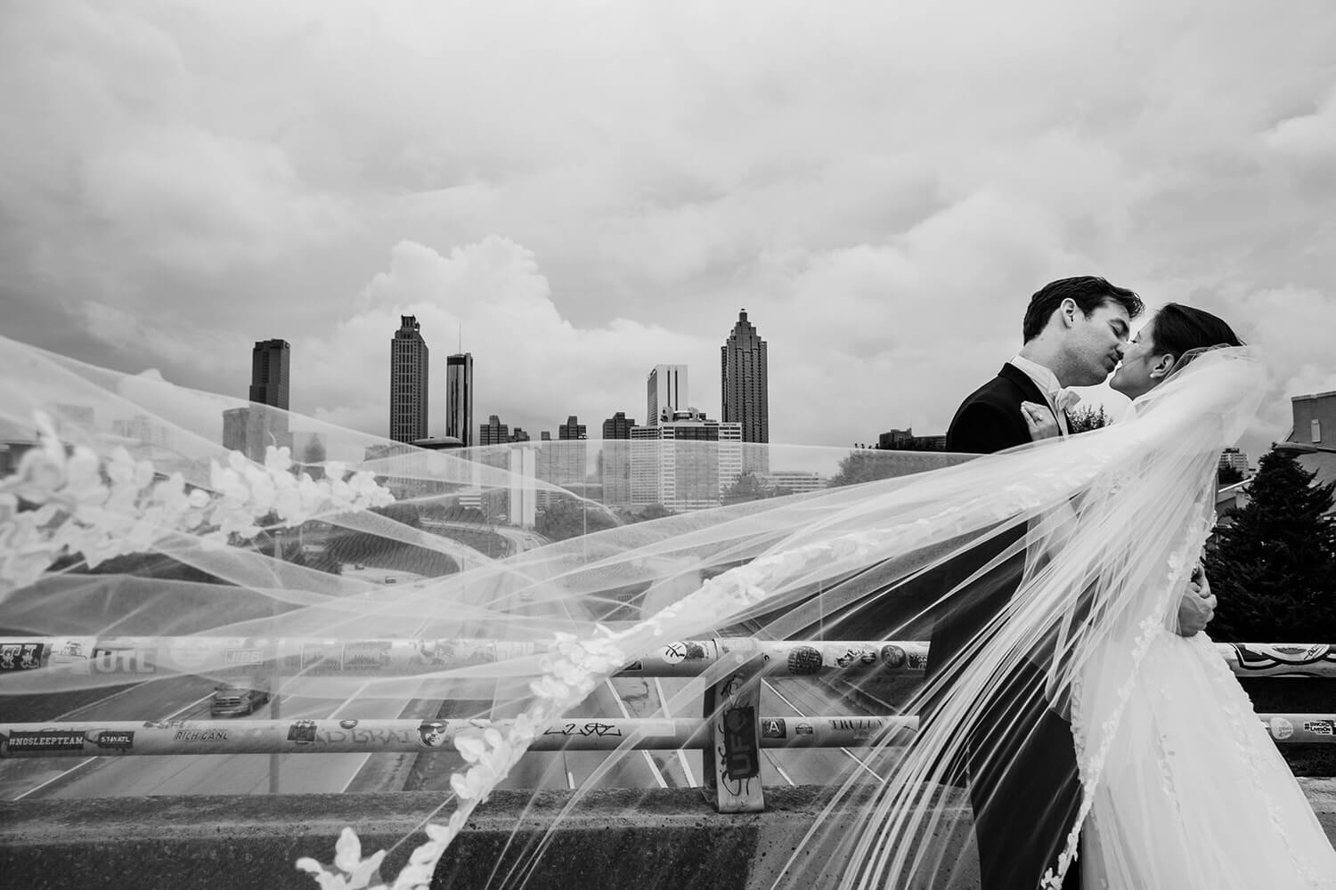 wedding couple at the Jackson Street Bridge