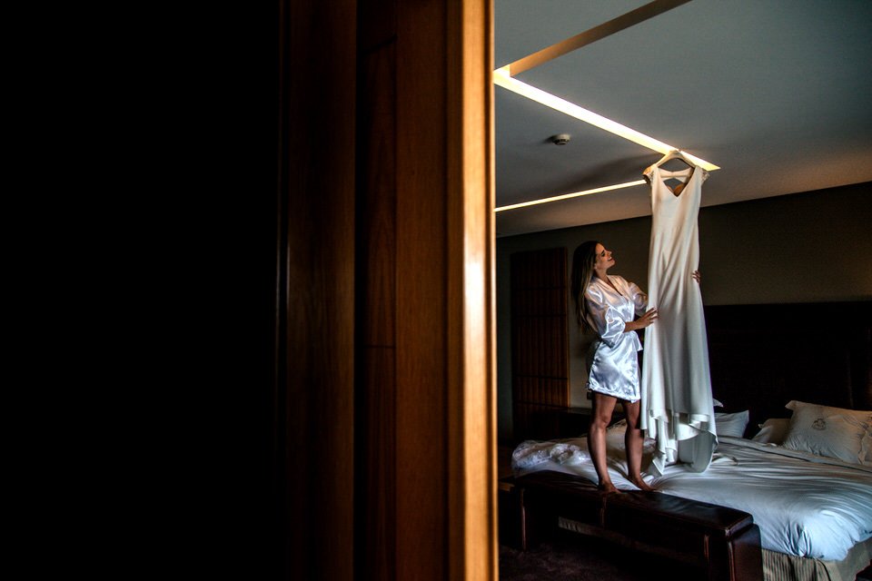 Bride getting ready with dress