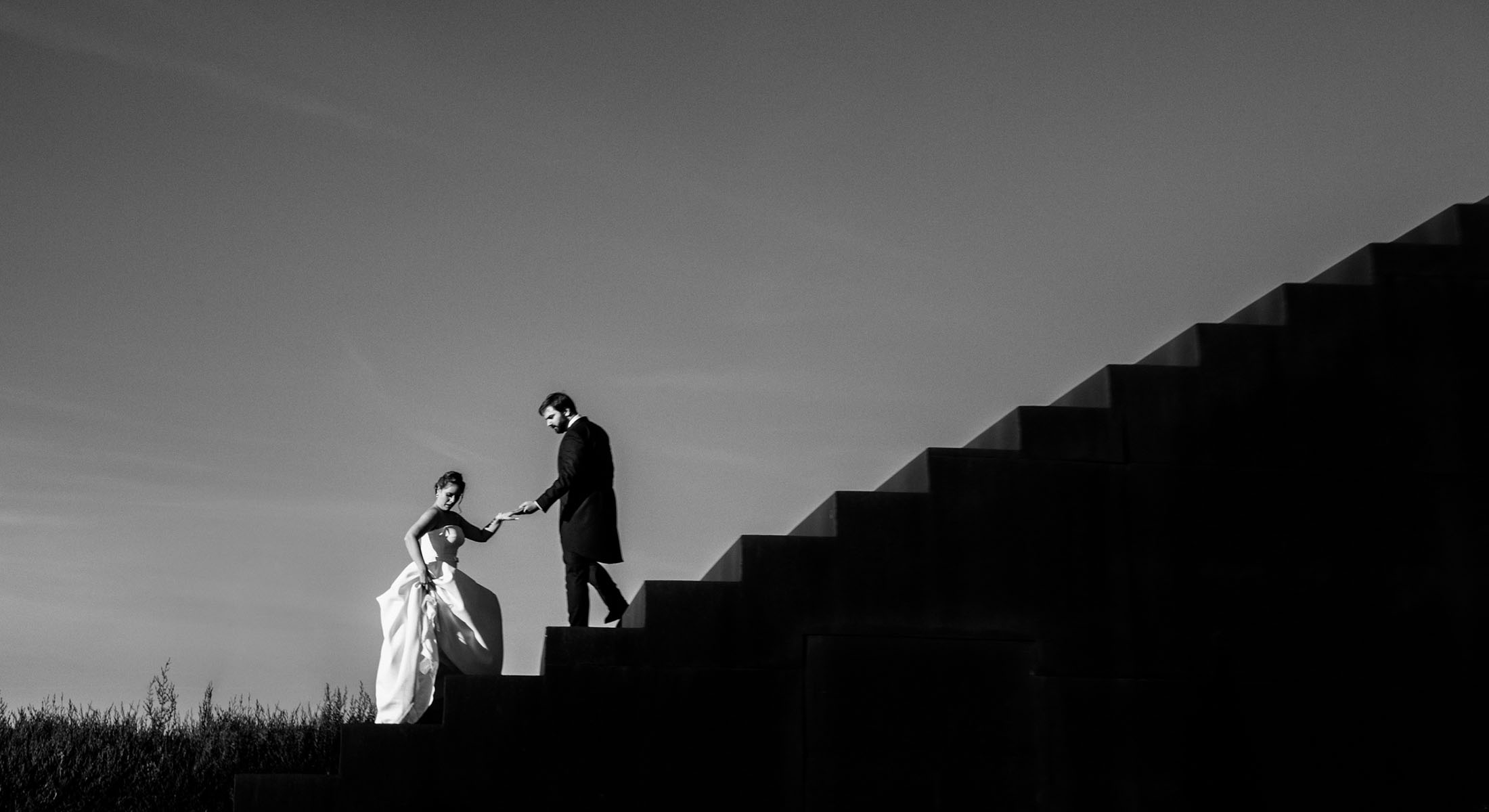 bride and groom on the stairs