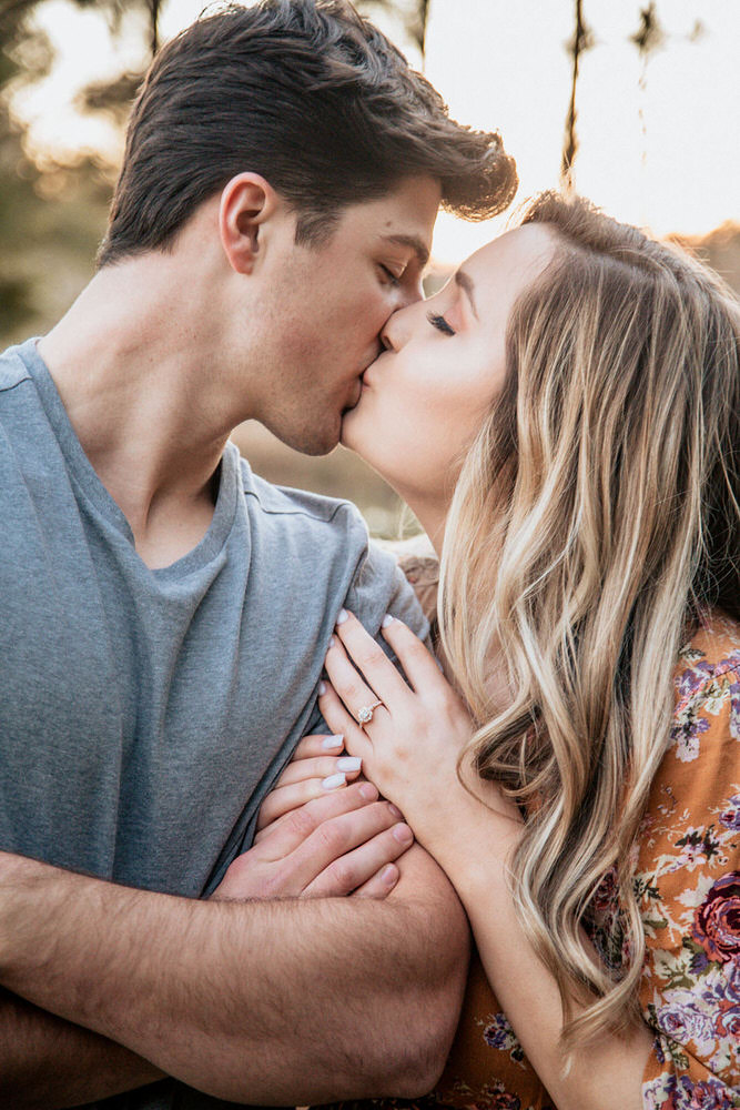 engagement session couple kiss engagement session