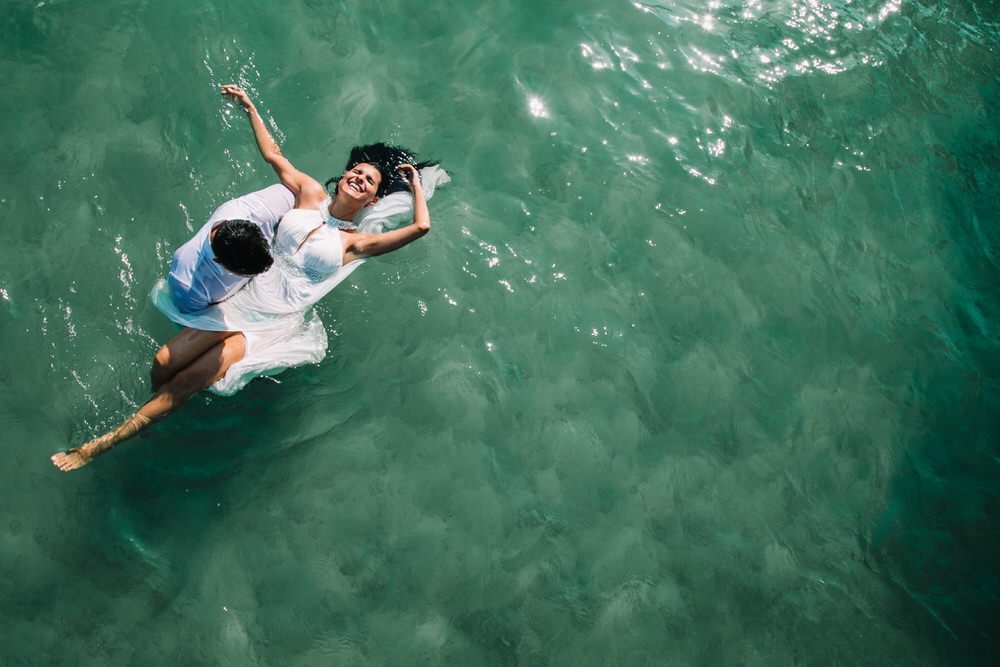 photography of couple in the water, photography from above