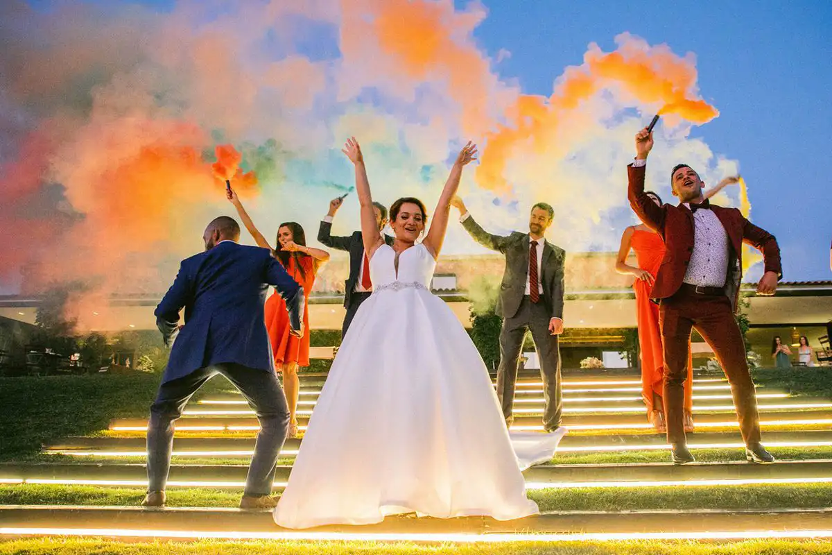 couple with colored smoke flares wedding