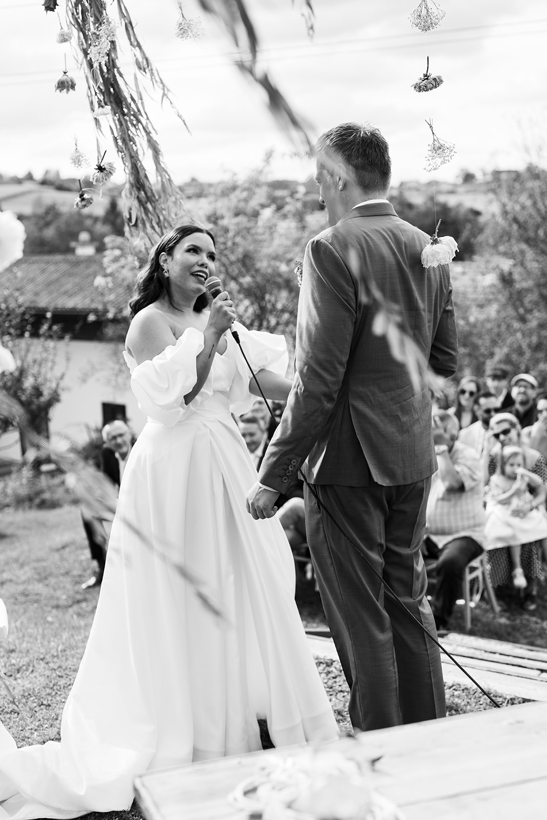 Outdoor vineyard wedding ceremony under tree at Weingut Holler, Austria