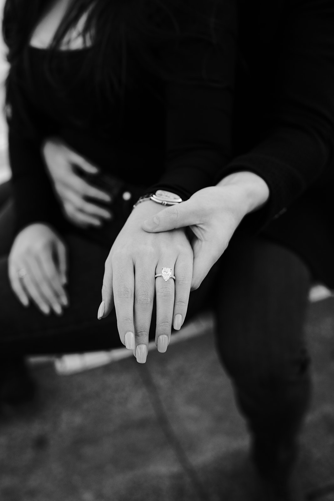 Close-up of the bride-to-be’s hand showing the engagement ring during a proposal at Ciudad de las Artes y las Ciencias in Valencia.