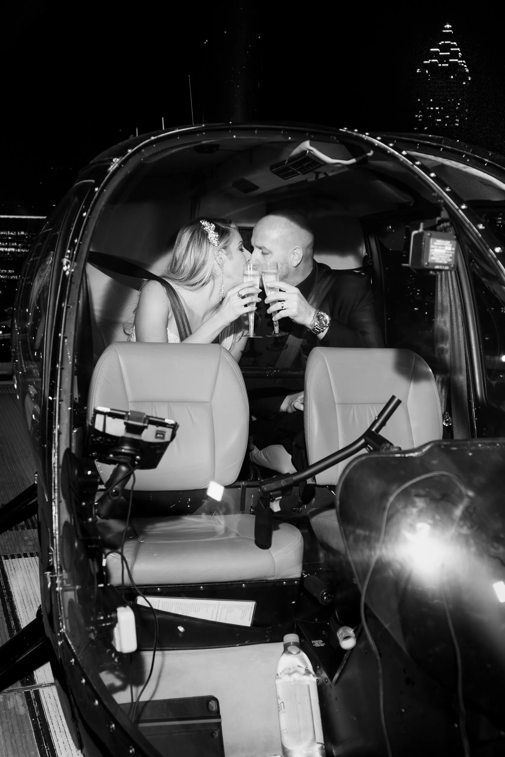 Wedding kiss at the helicopter