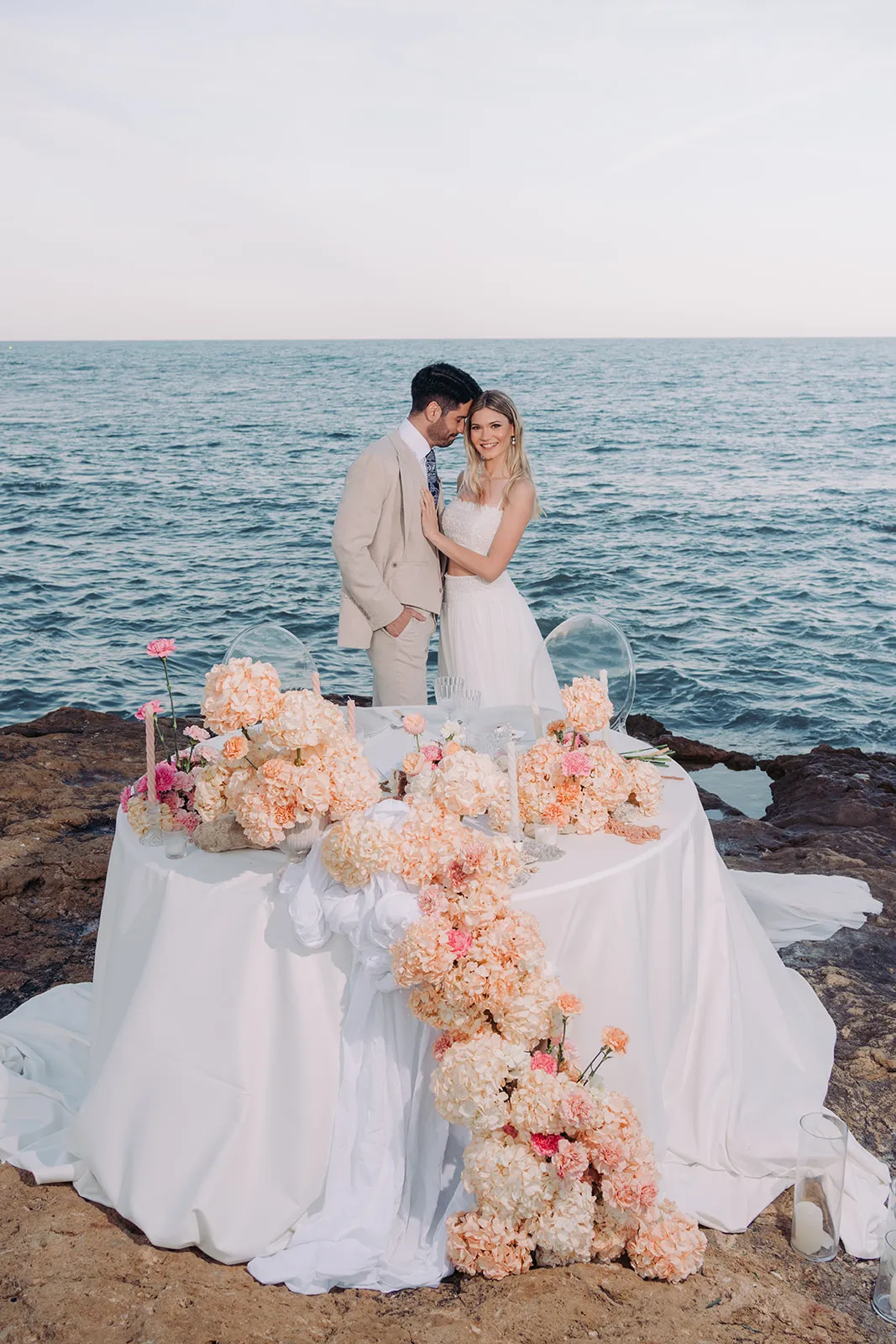Mediterranean shoreline, with soft golden light and natural textures.
