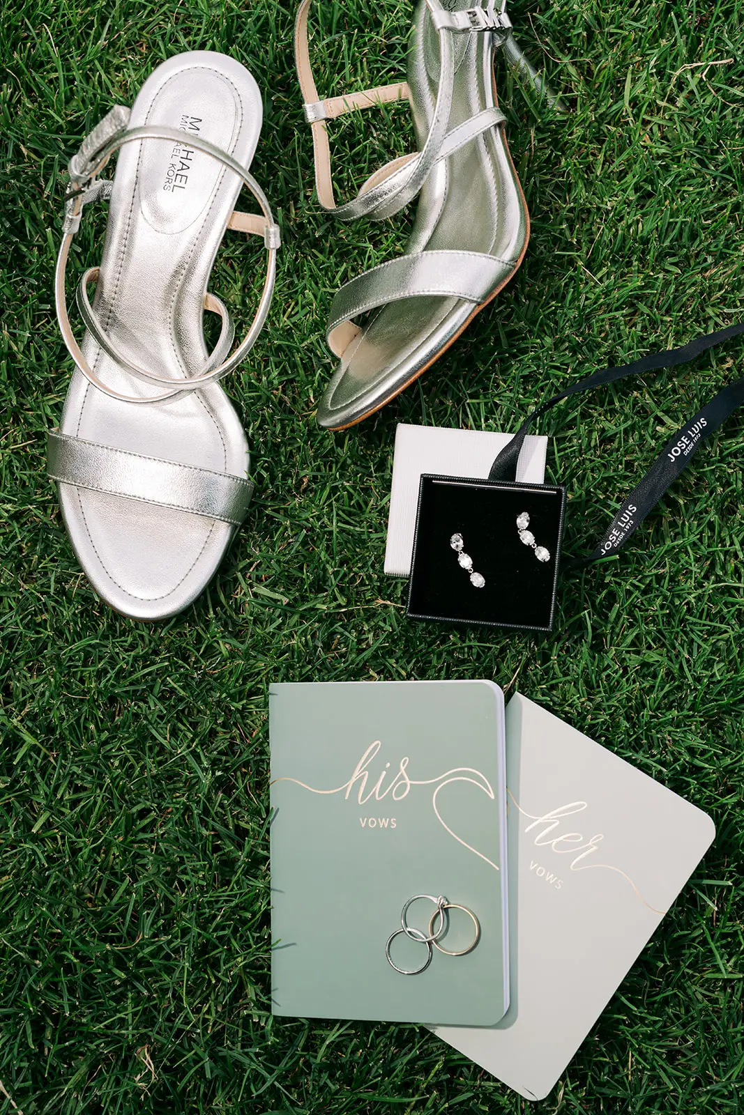 wedding detail shoes with rings vows book details composition
