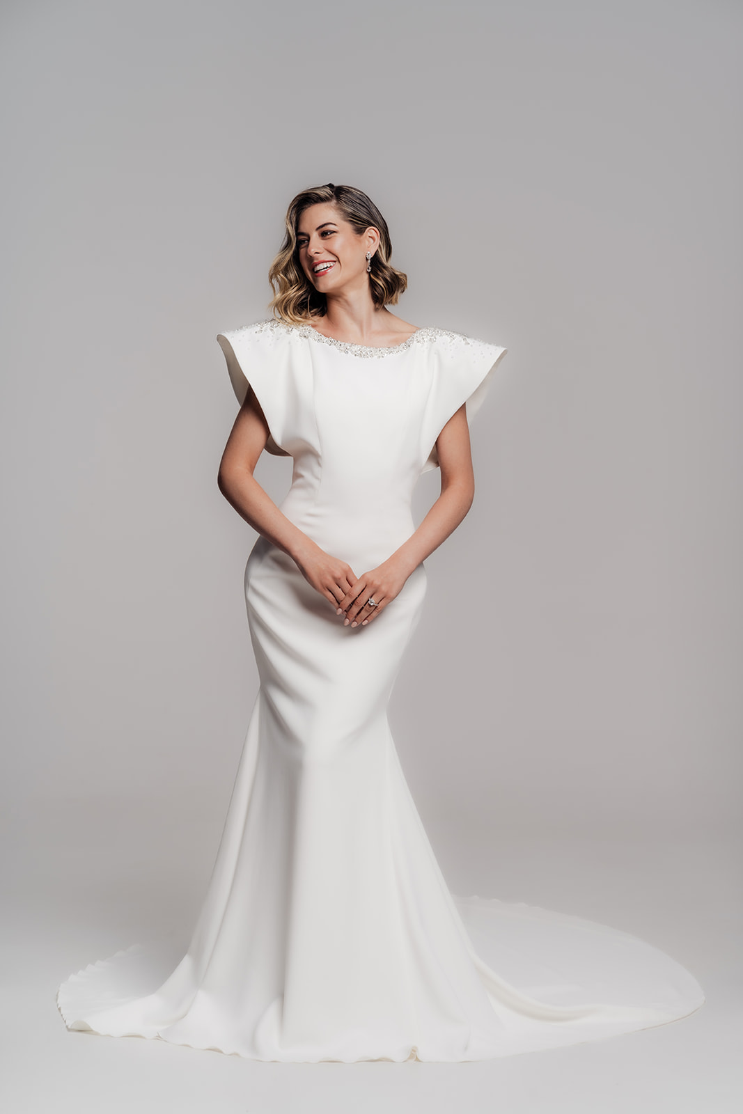 Minimalist bridal portrait with clean silhouette and soft light